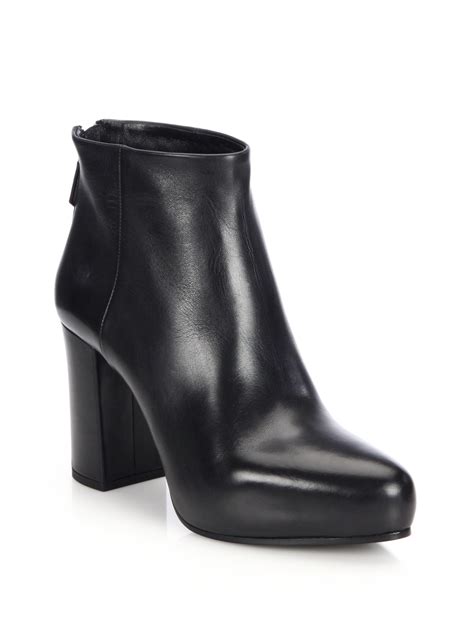 prada black herls|Prada block heel bootie.